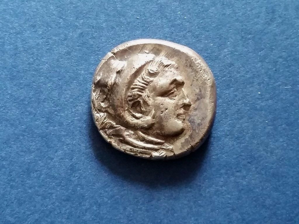 Two-Coins,-Same-Hammer