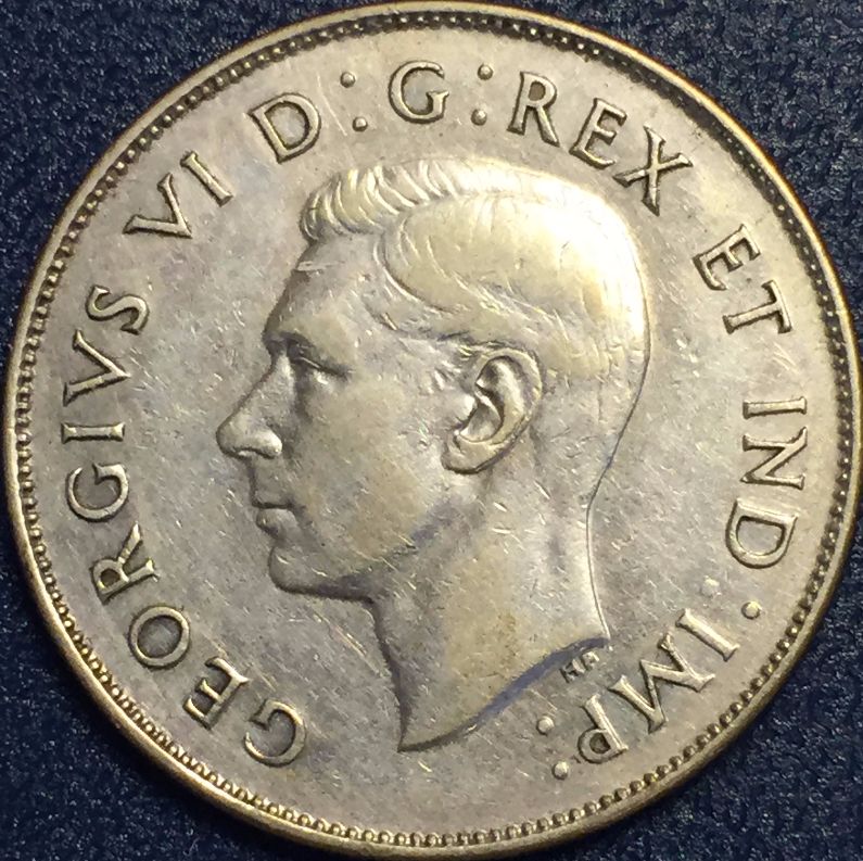 1947-Half-Curved-7-Ml-Coin-2