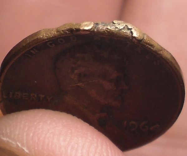 Did-Someone-Try-To-Melt-This-1964-One-Cent?