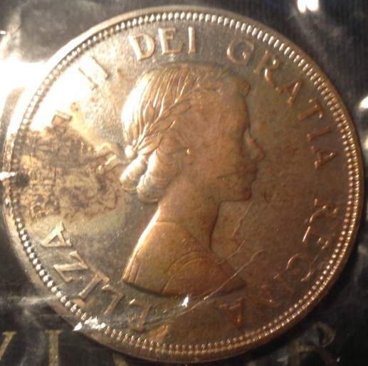 Weird-Spot-On-1964-Dollar