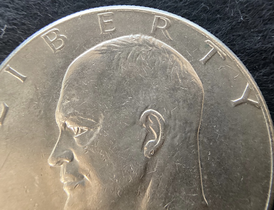 1976-D-Eisenhower-Dollar,-Type-1-Reverse:-Peg-Leg-R?
