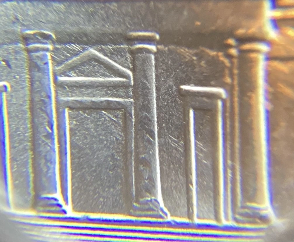 2021-P-Nickel-With-Feeder-Finger-Damage.