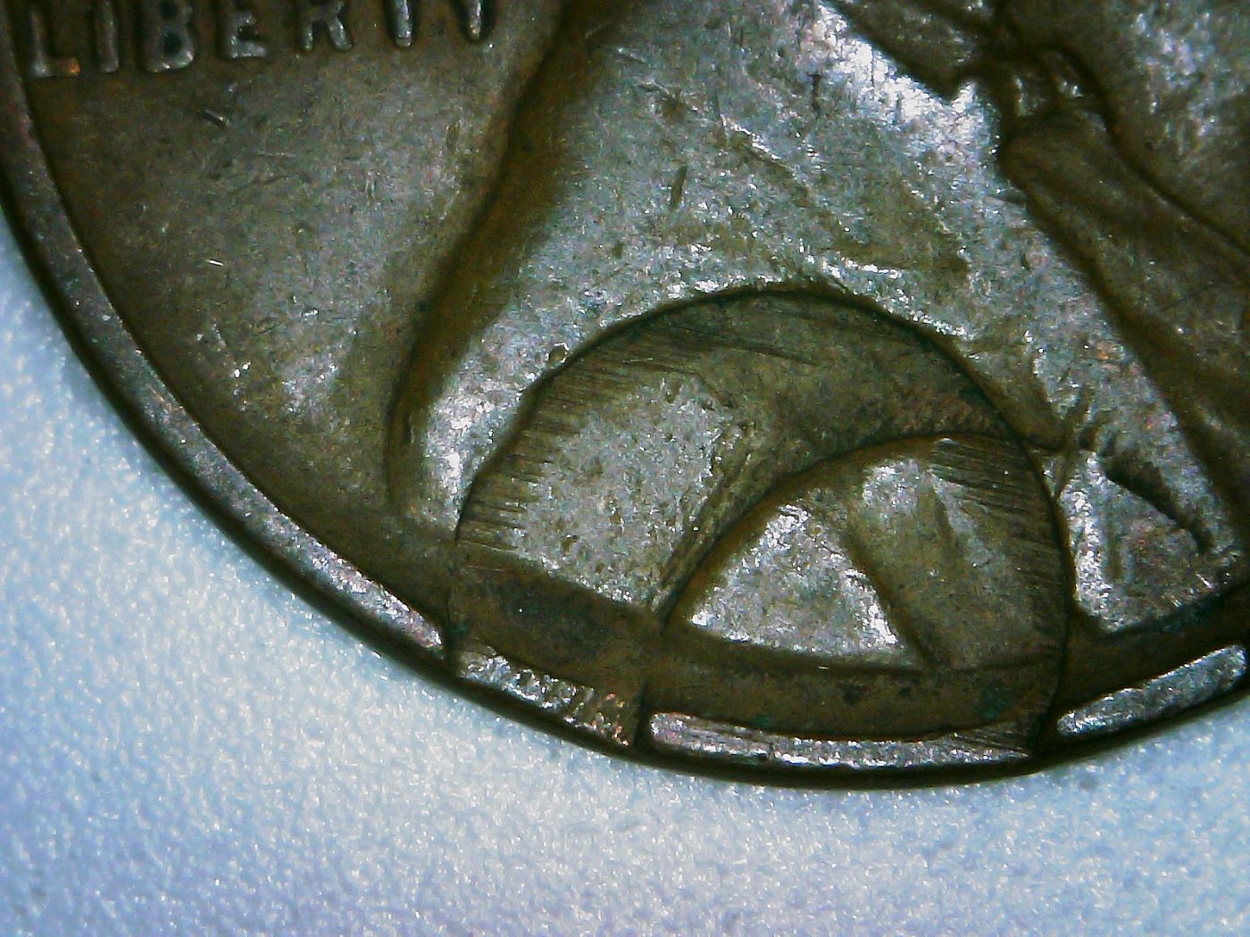 1937-Wheat-Penny-Die-Error-Or-Damage-After-Minting?