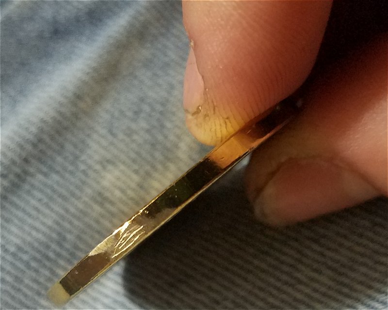 Does-This-Copy-Coin-Contain-Real-Gold?