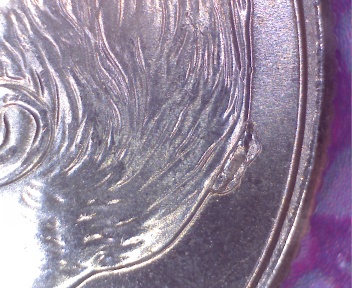 2005-P-Dime-With-A-Gouge---Maybe