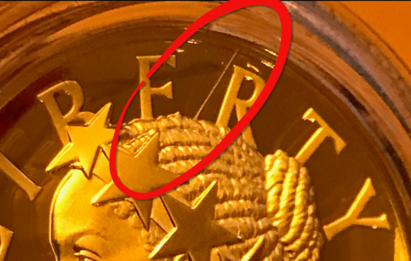 American-Liberty-225th-Anniversary-Gold-Coin---Scratch-Or-Error?
