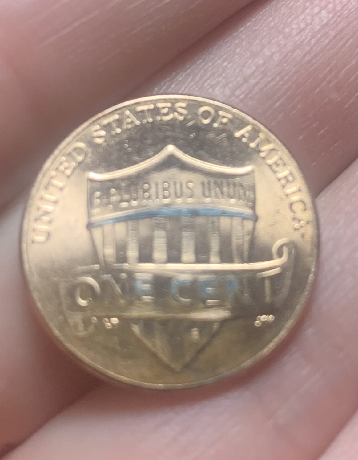 Is-Blue-Dye-On-2023-Lincoln-Coin-An-Error-Or-Damage?