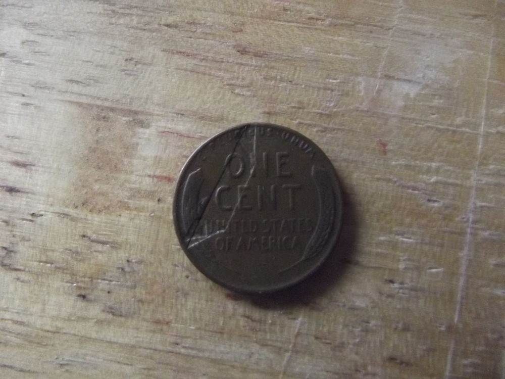 Large-Trapezoidal-Indent-On-Back-Of-1948-Wheat-Head-Penny?