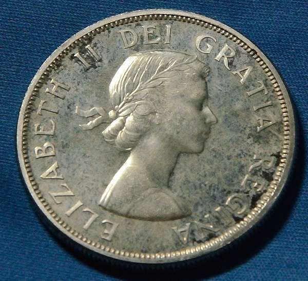 Grade-Opinions-Please,-1961-Silver-Dollar.