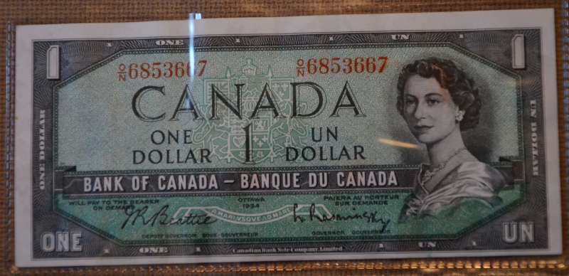 Unevenly-Cut-Or-Misaligned-Printing--$1-Bill-Question