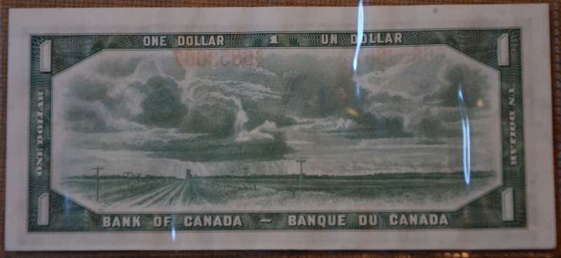 Unevenly-Cut-Or-Misaligned-Printing--$1-Bill-Question