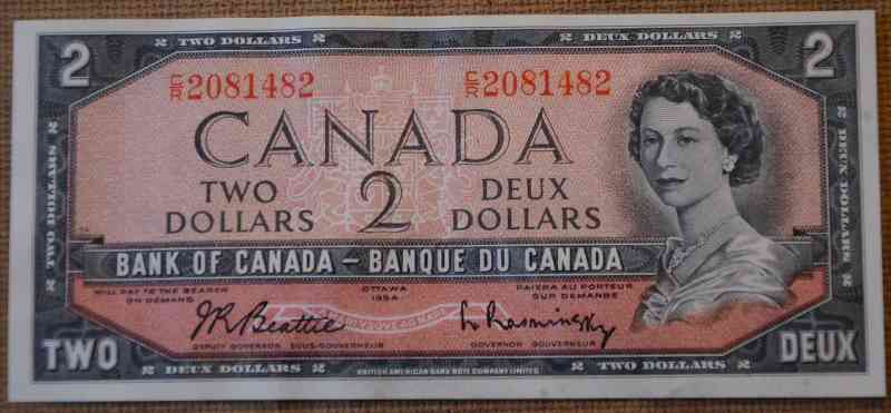 Unevenly-Cut-Or-Misaligned-Printing--$1-Bill-Question