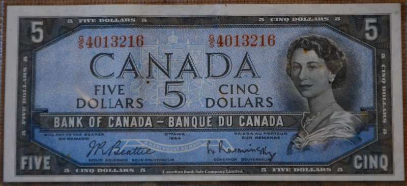 Unevenly-Cut-Or-Misaligned-Printing--$1-Bill-Question