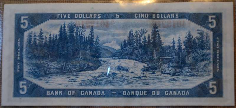 Unevenly-Cut-Or-Misaligned-Printing--$1-Bill-Question