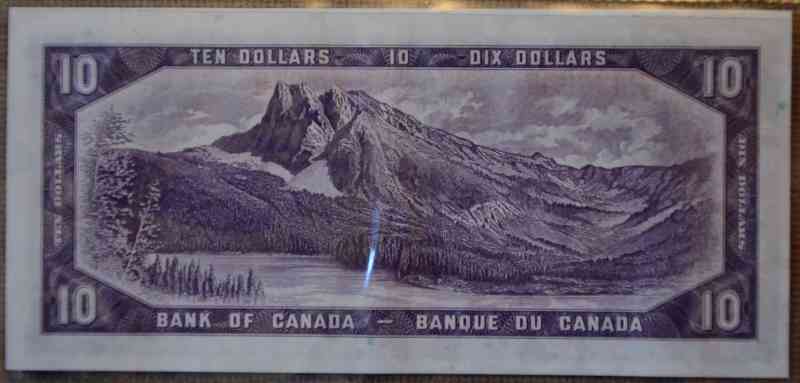 Unevenly-Cut-Or-Misaligned-Printing--$1-Bill-Question