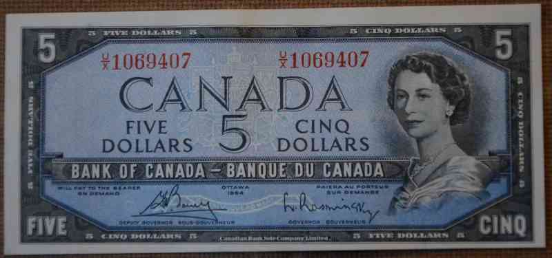 Unevenly-Cut-Or-Misaligned-Printing--$1-Bill-Question