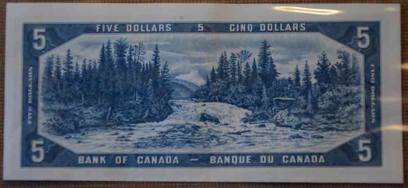 Unevenly-Cut-Or-Misaligned-Printing--$1-Bill-Question