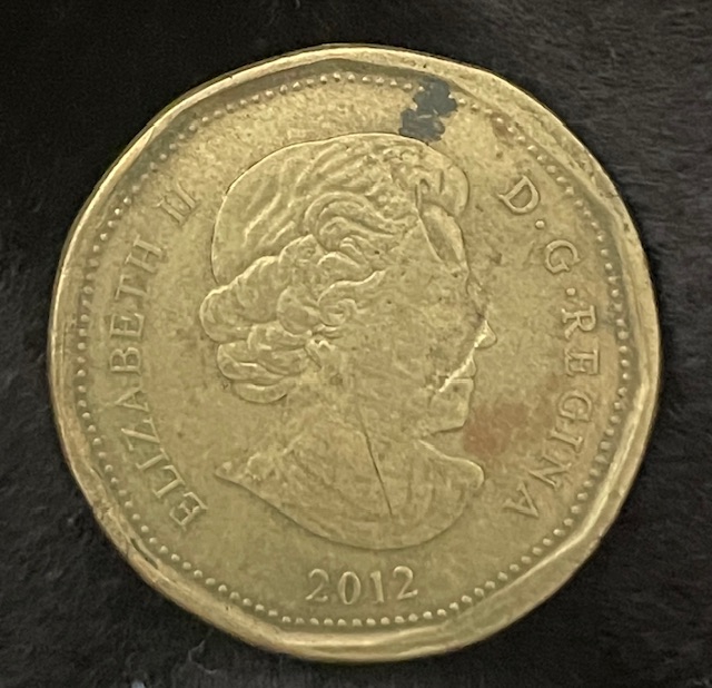 2012-Loonie-Stamping-Error-Or