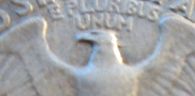'58-D-Quarter.--Die-Crack?--Extra-Head-Feather.