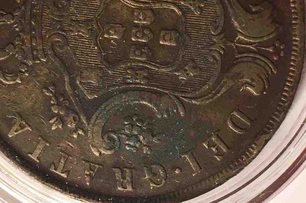 Green-Tarnish-On-1865-Portugal-Azores-Coin