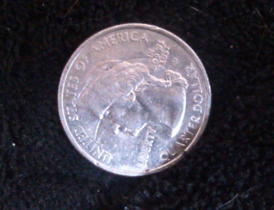 Weird-Circular-Mark-On-2000-Quarter
