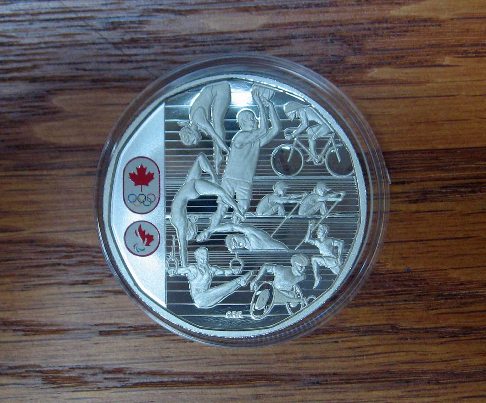 Limited-Edition-Proof-Silver-Dollar-–-Celebrating-Canadian-Athletes-2016