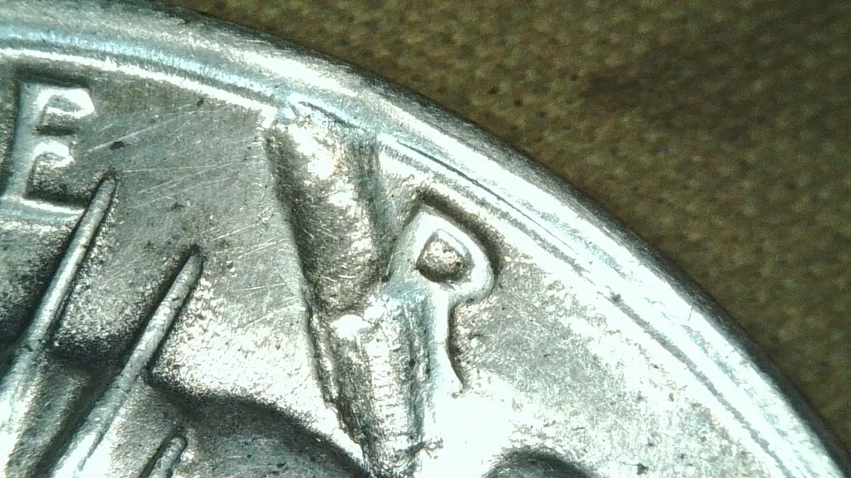 1934---D-Peace-Dollar-Mark