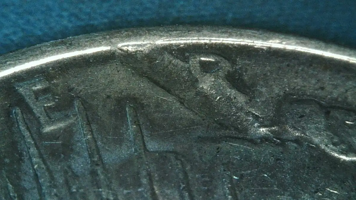 1934---D-Peace-Dollar-Mark