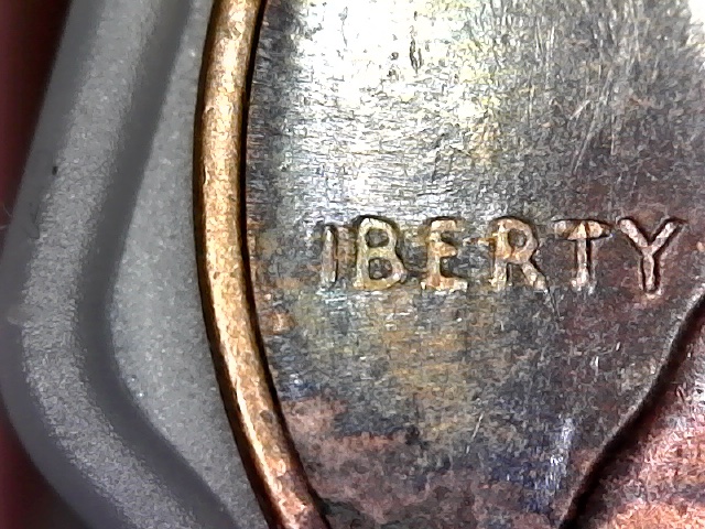 LMC-No-L-In-Liberty-Is-This-Result-Of-Grease-Strike-Through?