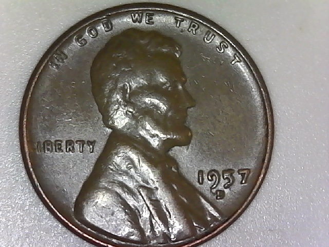 1957-D-What-Is-The-Raised-Chunk-Next-To-The-Mint-Mark?