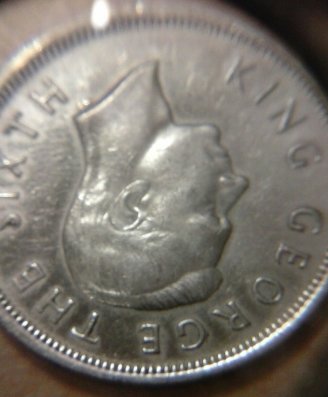 Odd-1942-New-Zealand-Penny---Silver?