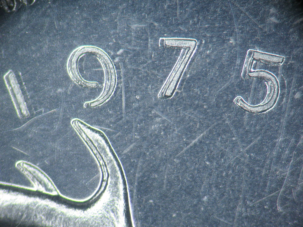1975---25-Cent---Amazing-H-Mint-Mark.