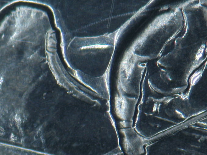 1975-PL-Nickel-Dollar-Wild-Clash-Die-Reverse