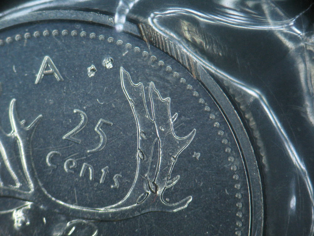 1986-PL-Coin-Sealed-With-Damage..50-Cent-Piece..