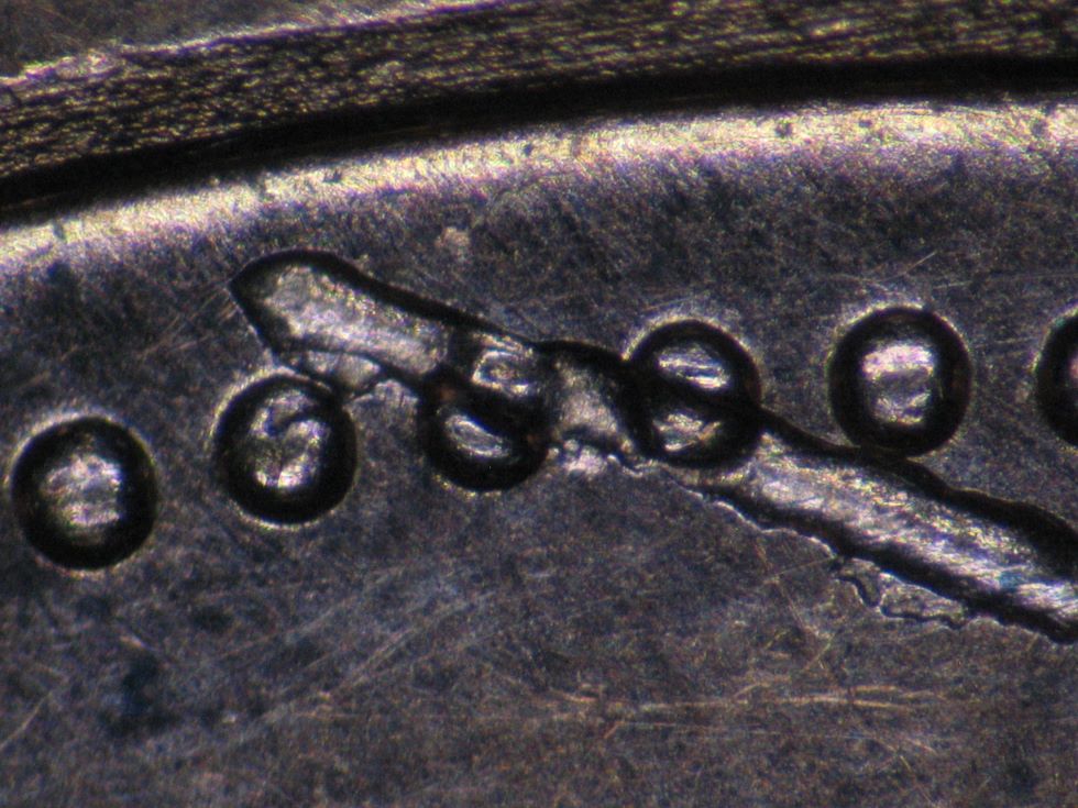 2006-1-Cent-Struck-Over-Damaged-Planchet---Broken-D
