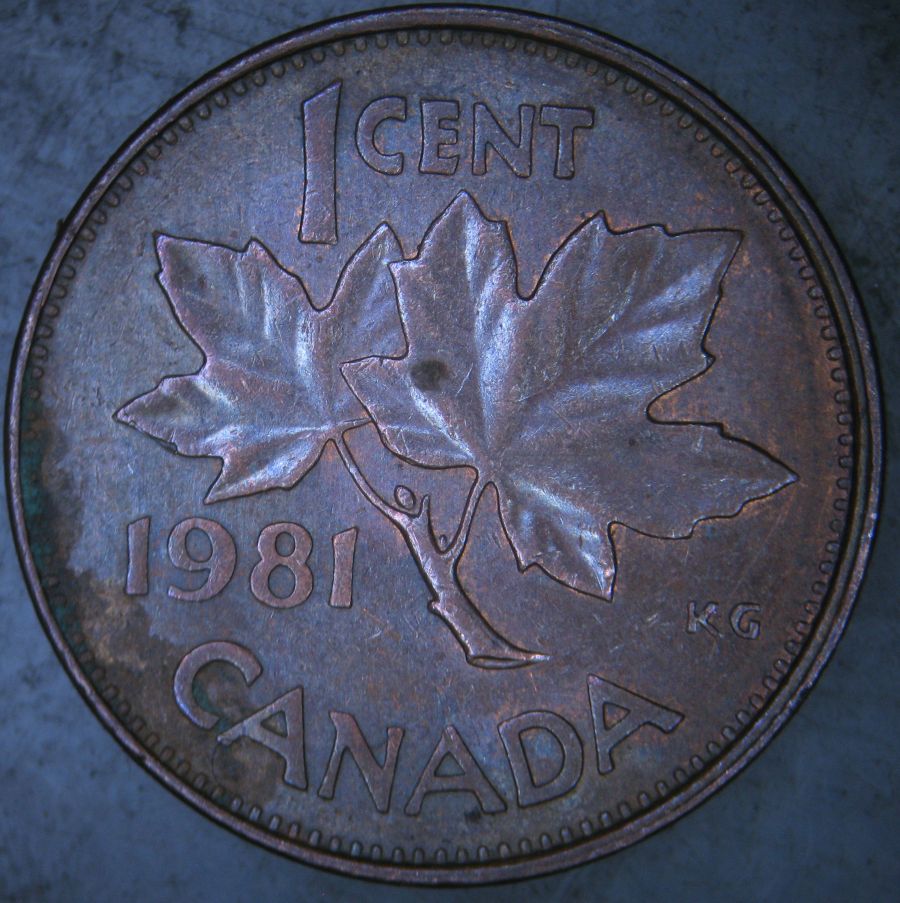 1981-Canadian-1-Cent-Struck-Through-A-Very-Long-Thread