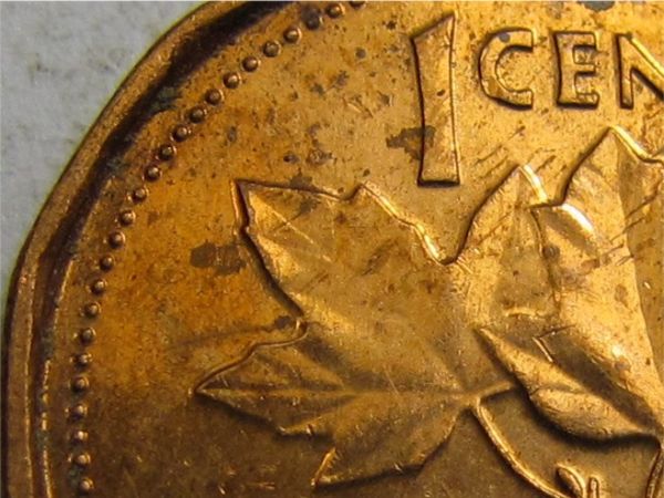 1993-One-Cent.doubling...leaves.letters.crown.hair.neck