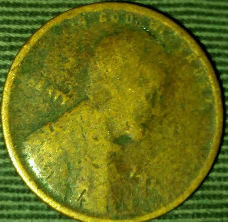 1910-Struck-Through-Grease-Wheat-Cent-Error.-It's-A-New-Version!