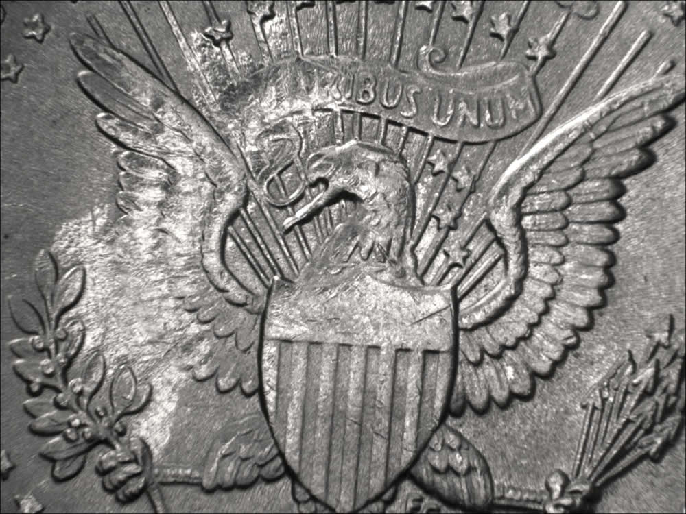 1994-P-Kennedy-Half-With-A-Double-Speared-Wings-And-Struck-Thru.-Grease.