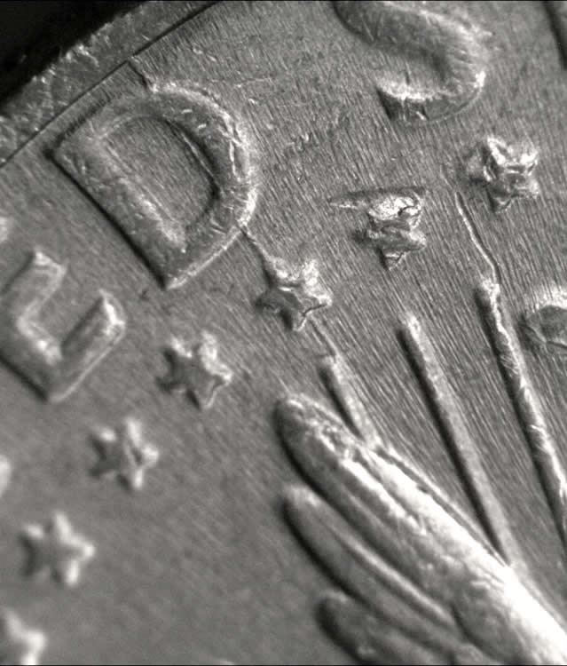 1994-P-Kennedy-Half-With-A-Double-Speared-Wings-And-Struck-Thru.-Grease.
