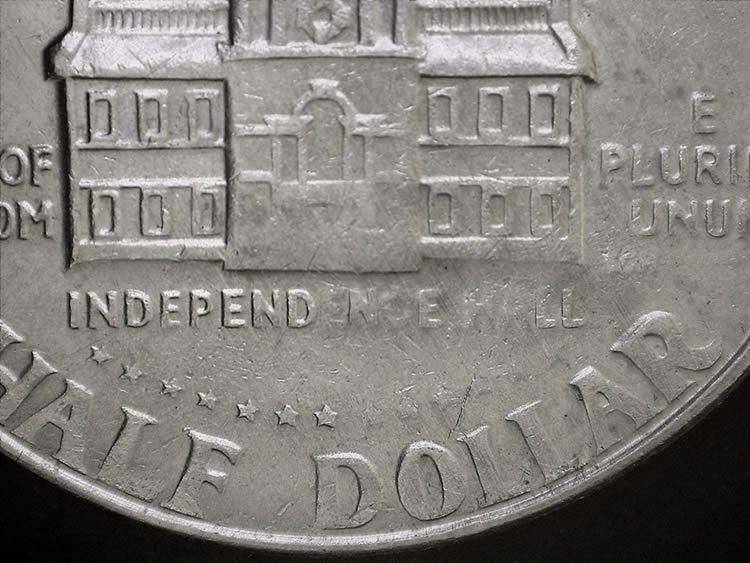 1976-D-Bicentennial-Kennedy-Half-Dollar-Struck-Through-Filled-Die.