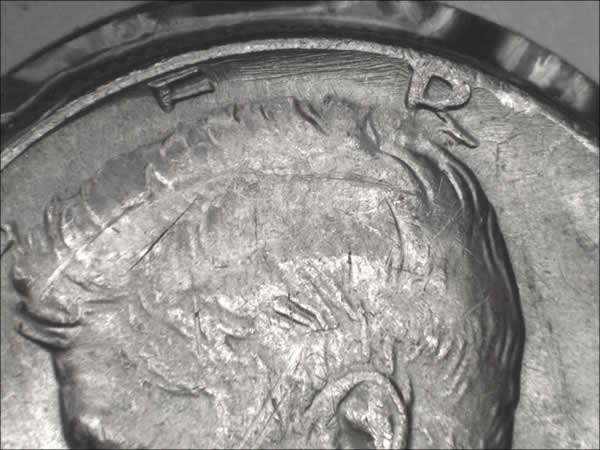 1982-P-Kennedy,-Damage?-Planchet-Flaw?-Or-Struck-Thru?