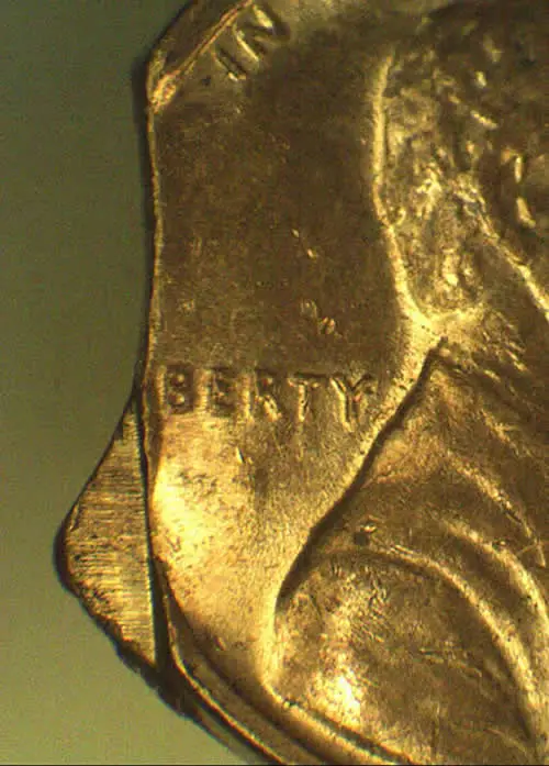 1972-S-Cent-,-Unusual-Curved-And-Straight-Clips-Combined
