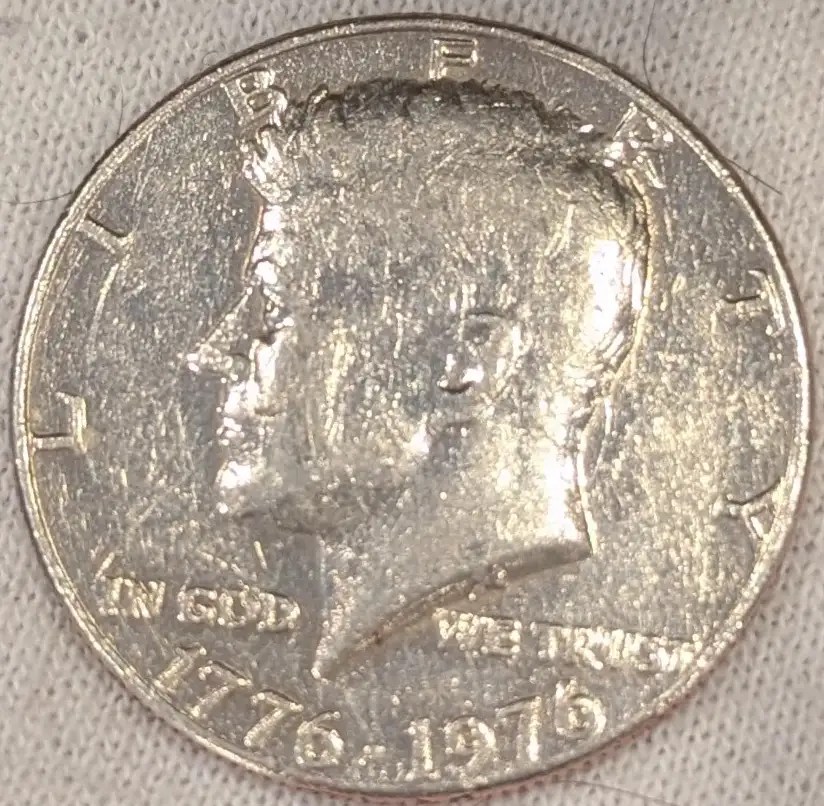 Is-This-Blob-On-This-Bicentennial-Half-Dollar-Post-Mint-Damage?