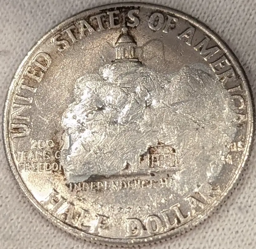 Is-This-Blob-On-This-Bicentennial-Half-Dollar-Post-Mint-Damage?