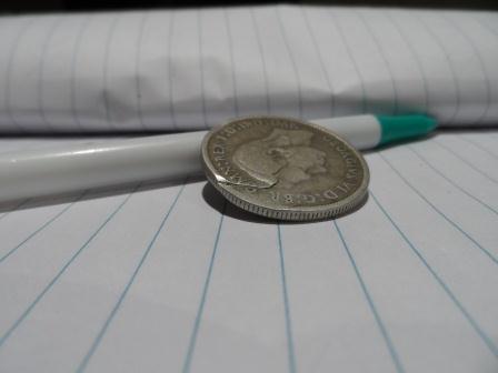 Very-Strange-Double-Face-Coin