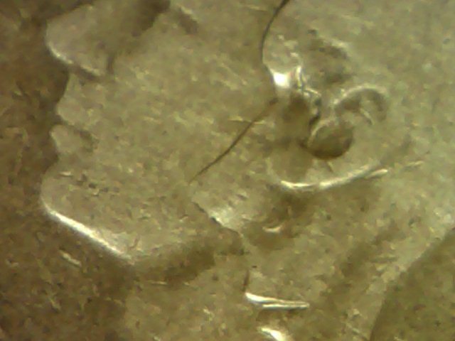 Very-Strange-Double-Face-Coin