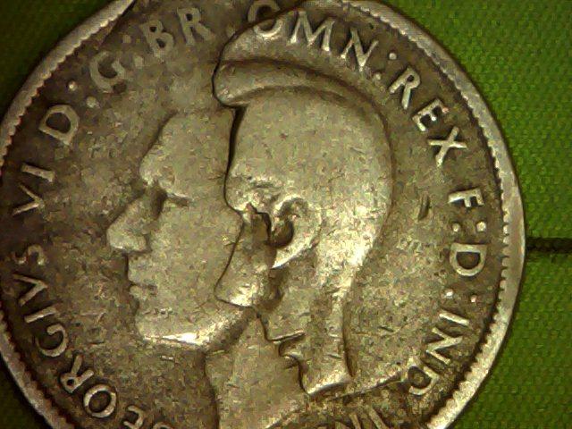 Very-Strange-Double-Face-Coin