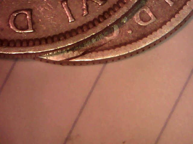 Very-Strange-Double-Face-Coin