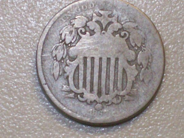 Its-All-About-The-Shield-Nickel